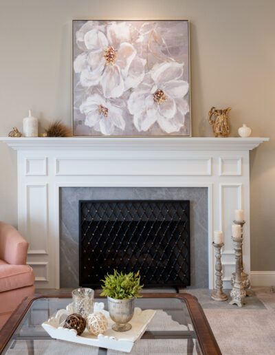 A living room with a fireplace.