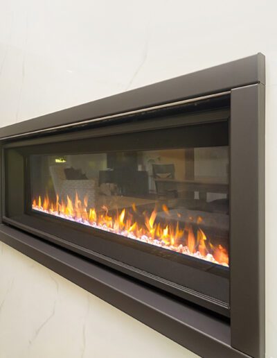 An electric fireplace in a modern living room.